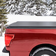 Access Cover Limted Edition Roll-up Cover on a red truck in the snow