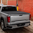 Access Cover LOMAX® Stance™ black diamond mist finish on a silver truck